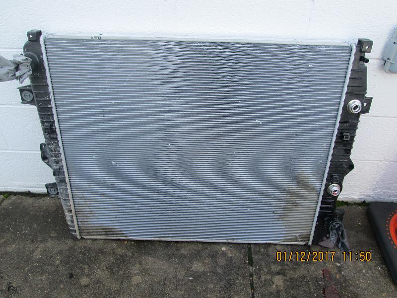 Radiator damaged from inside engine compartment at 4,700 miles-engine-side-2.jpg
