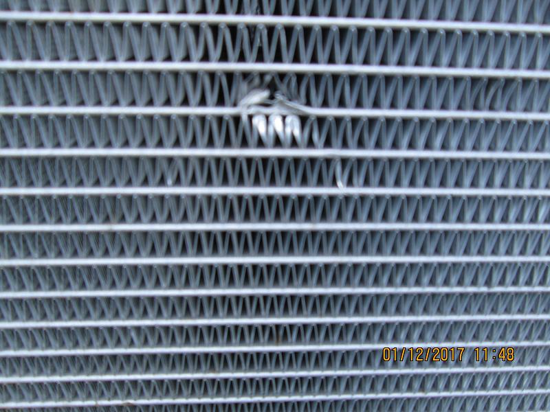 Radiator damaged from inside engine compartment at 4,700 miles-damage-1.jpg