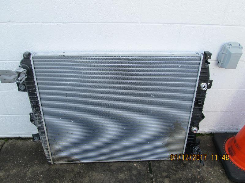 Radiator damaged from inside engine compartment at 4,700 miles-engine-side.jpg