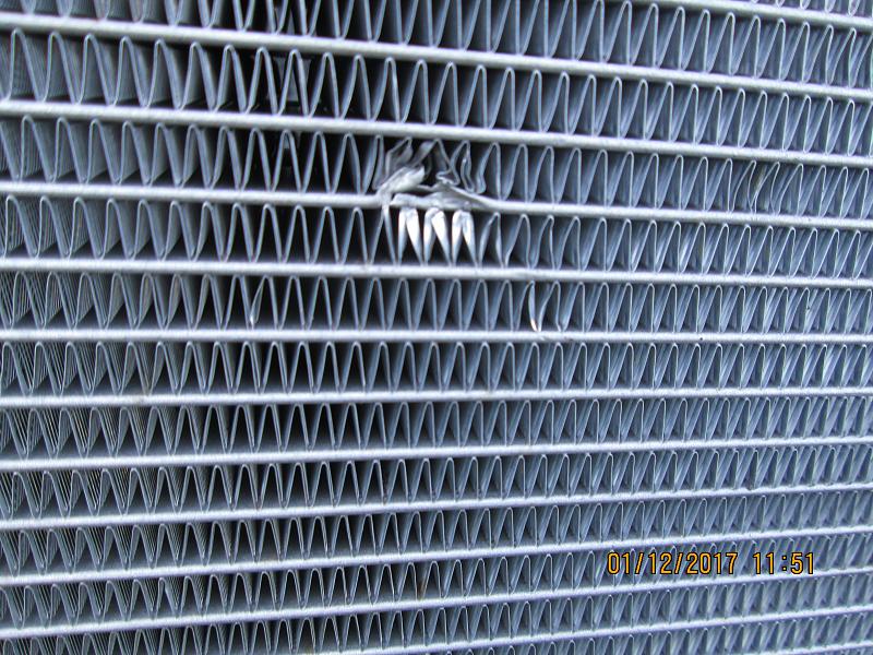 Radiator damaged from inside engine compartment at 4,700 miles-damage-2.jpg