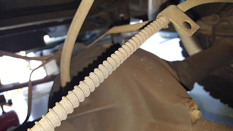 1986 Chevy K10 Question on rear emergency brake cable holder? or bracket?-ebrake-bracket-missing-fasteners-4.jpg