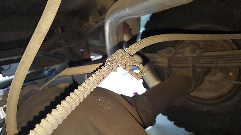 1986 Chevy K10 Question on rear emergency brake cable holder? or bracket?-ebrake-bracket-missing-fasteners-2.jpg