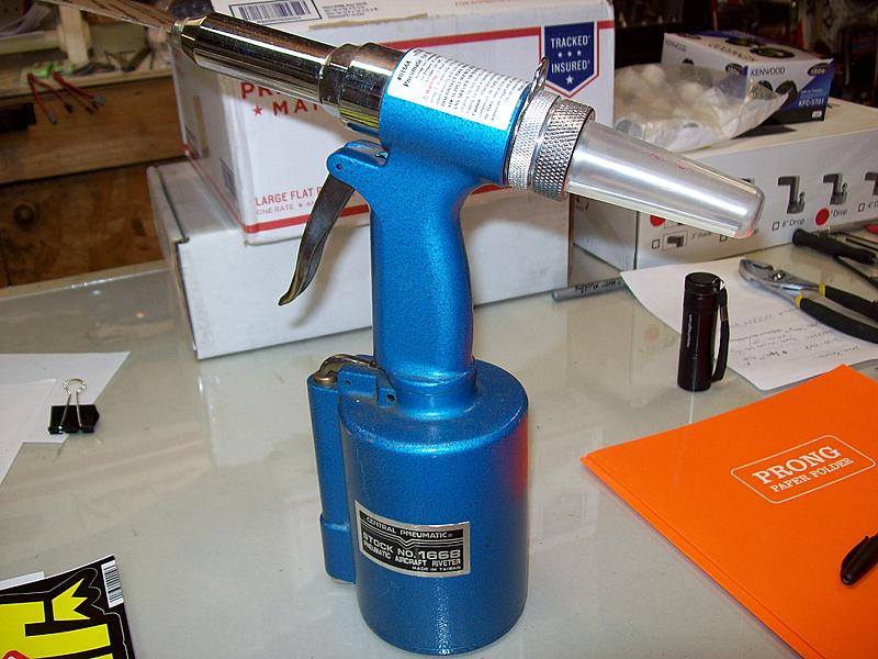 removing black door panels on side/rear cargo doors-pop-rivet-gun.jpg