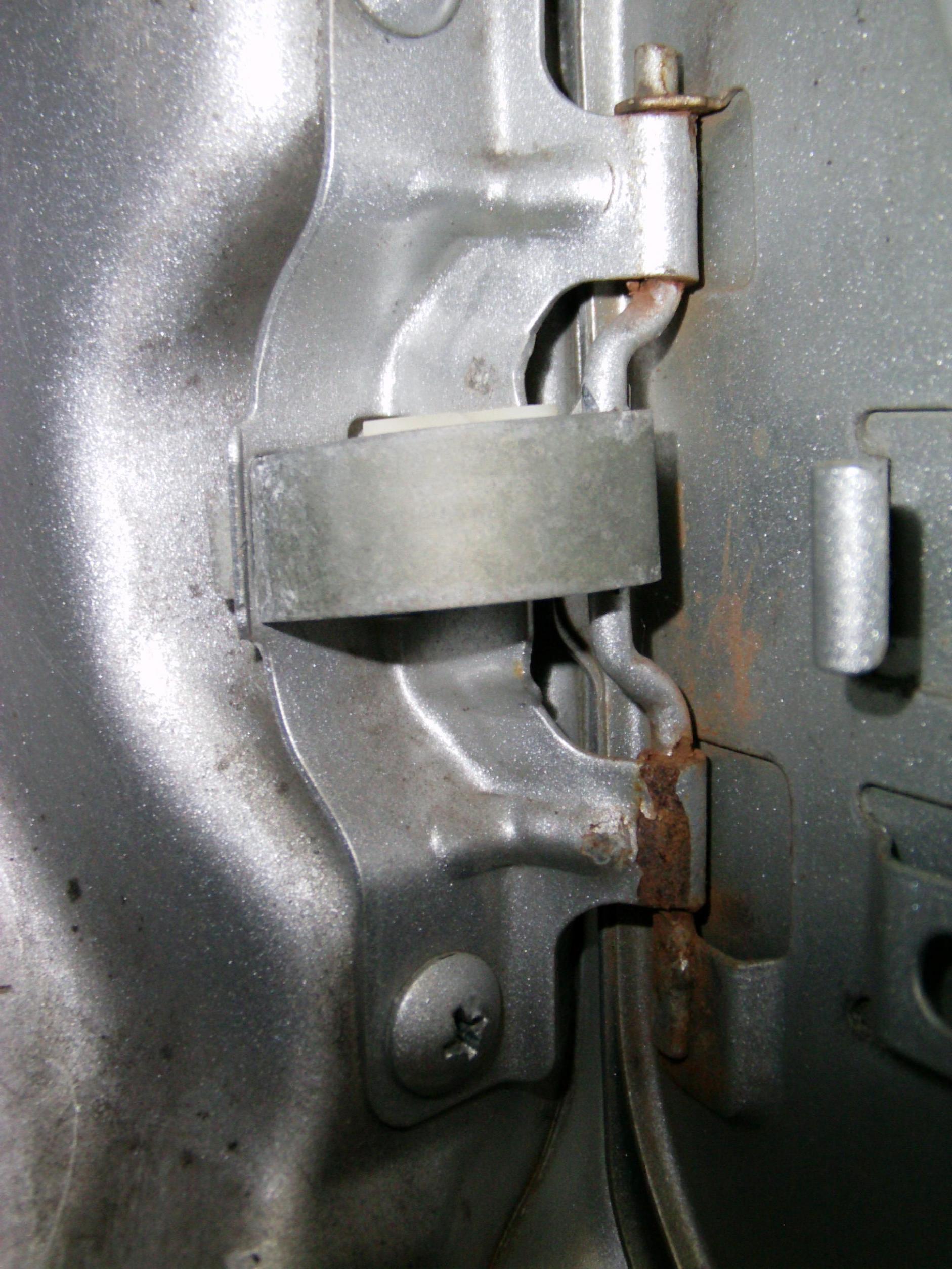 Fuel door spring