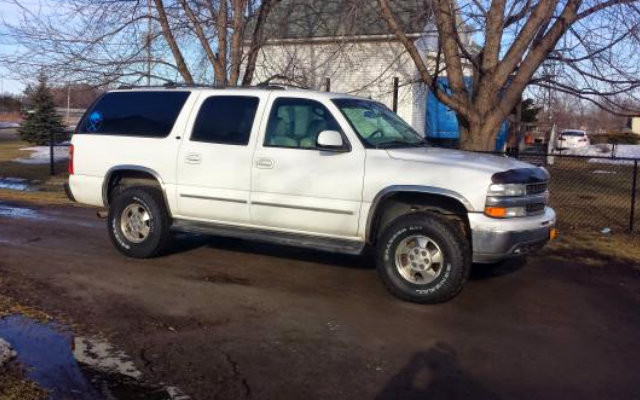 TRUCK YOU! A White 2002 Suburban LT 4X4 in the Garage!