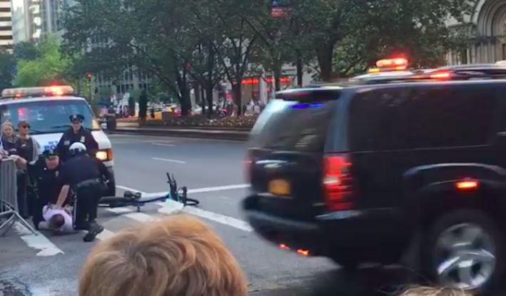 Watch a Cyclist Try to Cross the Presidential Motorcade in NYC