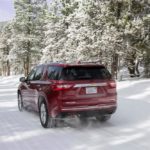 Chevrolet Traverse driving in snow.