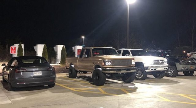 Chevrolet and Ford Trucks Block a Tesla Charger