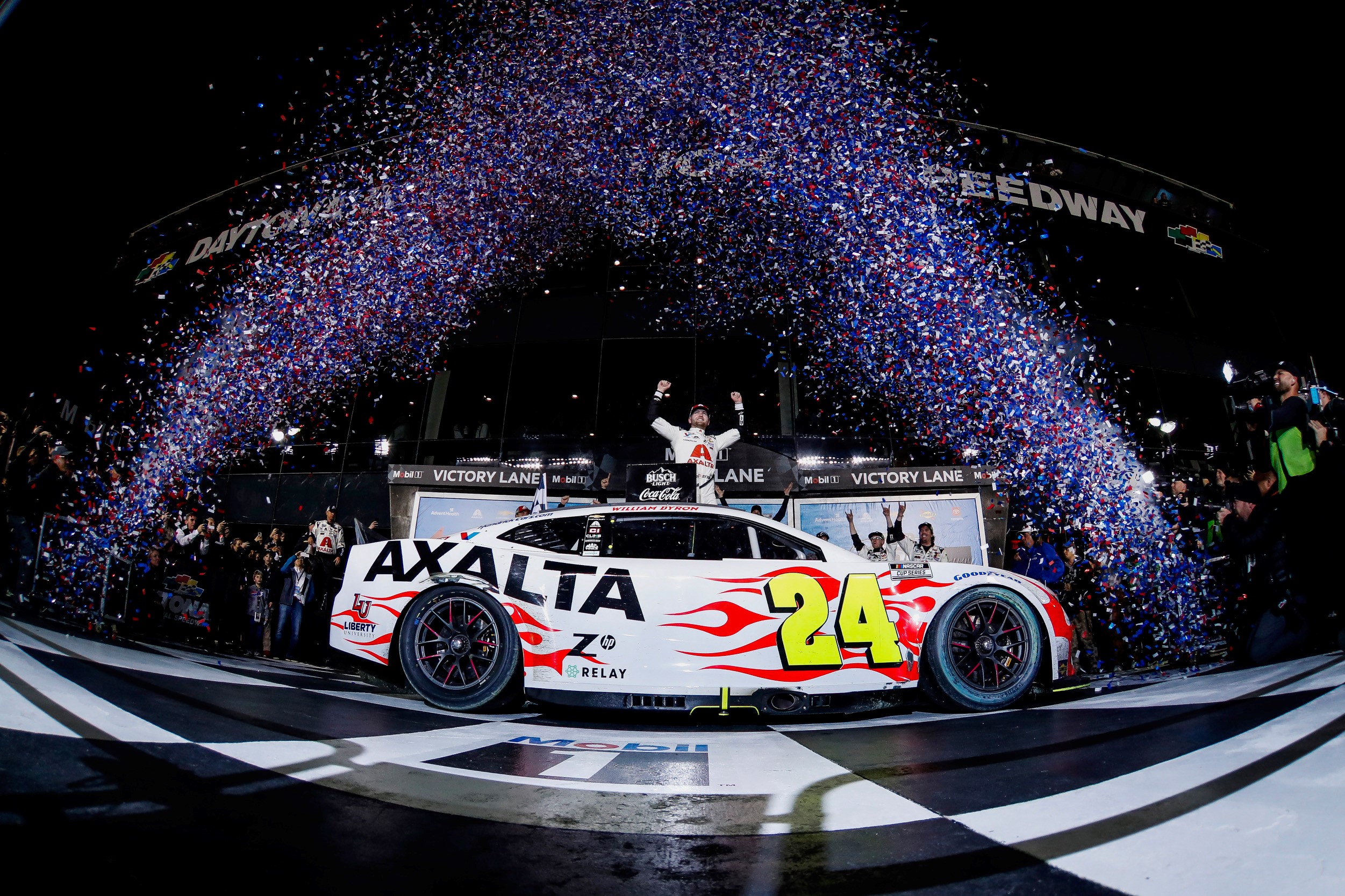 Team Chevy driver William Byron and the No. 24 Hendrick Motorsports Camaro ZL1 team celebrating their victory at the 2024 Daytona 500. (Photo by Harold Hinson/HHP for Chevy Racing)